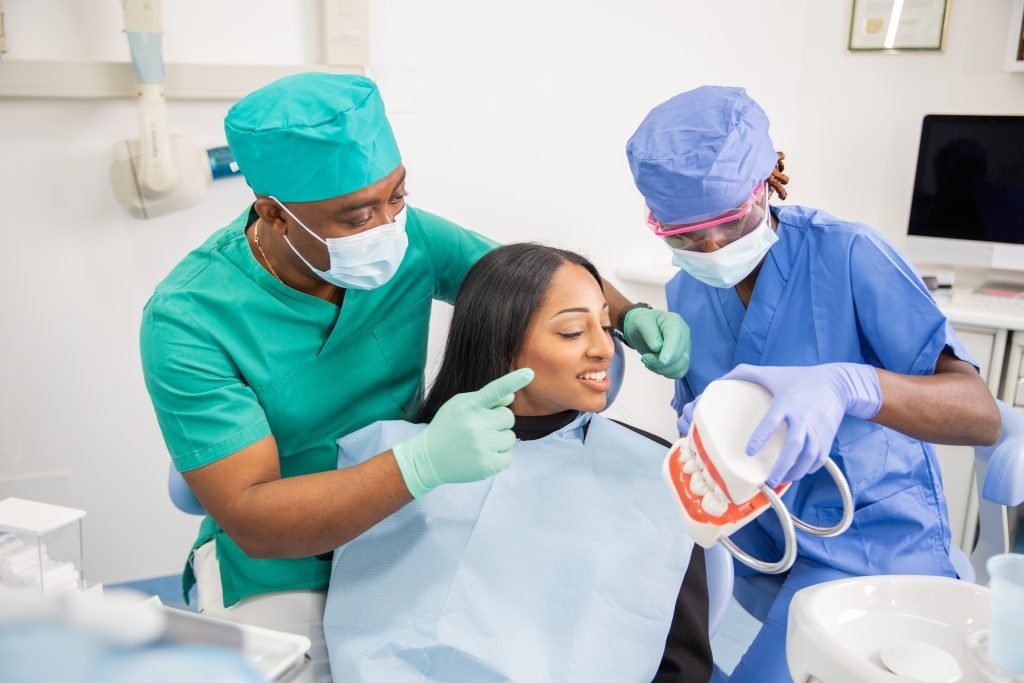 Dentist providing patient-focused care at All Smile BDS.